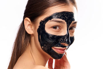 happy woman with black mask on face