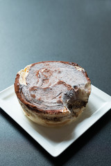 tiramisu on black table with copy space