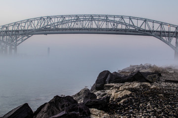 Obraz premium Blue Water Bridges. The twin spans of the Blue Water Bridges encased in fog. The international border connects the Sarnia, Ontario, Canada with Port Huron, Michigan, USA.