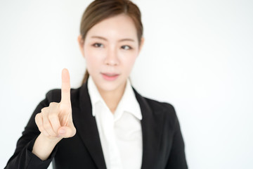 Asisn businesswoman touching tactile interface, multimedia security or technology concept. white background.