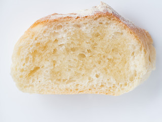 Piece of french bread with honey
