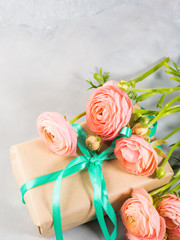 Beautiful Pink ranunculus flowers bouquet and gift box. Valentine mother day. Wedding birthday present