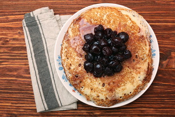 Delicious pancakes with cherry jam