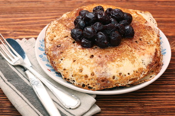 Delicious pancakes with cherry jam