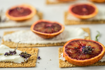 small loafs with cream cheese, and red orange