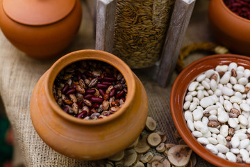 Beans on a wooden table, space for your text. Sports nutrition, protein products, culinary background.