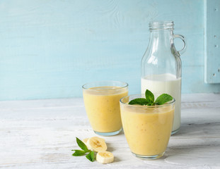 Fresh banana milk drink, a cocktail for Breakfast in a transparent glass