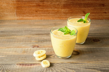 Fresh banana milk drink, a cocktail for Breakfast in a transparent glass