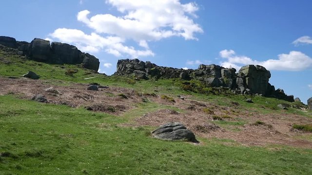 Rocky landscape dominates the skyline of Ilkley Moor, Yorkshire, UK. Cow and Calf is the name given to two unique rocks.