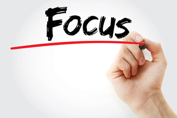 Hand writing Focus with marker, concept background