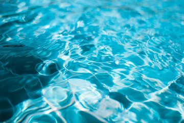 Close up ripple water surface in swimming pool