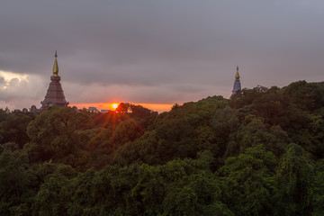 Beautiful Colorful Sunrise and Silhouette Mountain on the top of mountain in Thailand 
