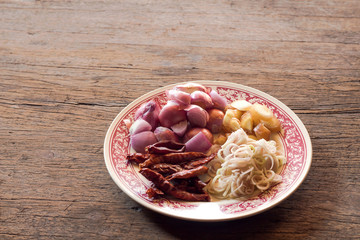 ingredient of thai spicy soup in mortar,raw food for making curry paste