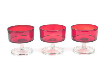 Empty alcohol glasses isolated on white background