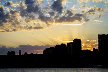 Obraz na płótnie Canvas Sillhouette city at sunset background