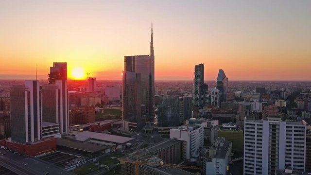milan city skyline aerial view flying towards financial area skyscrapers