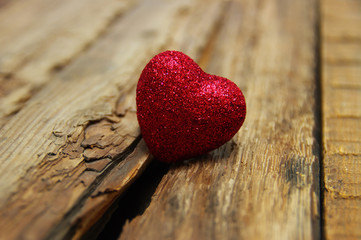 Red heart on wood