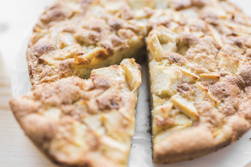 Apple pie and a cut piece of pie