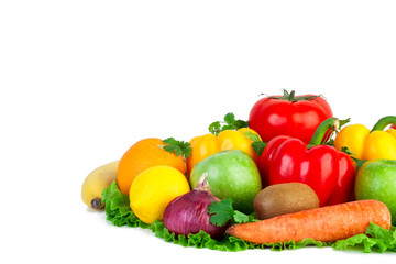 Fresh vegetables and fruits on isolated background. Close-up of vegetables. Tomato, pepper, carrots, onions, kiwi, lemon, orange, apple