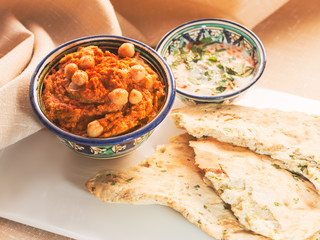 hummus and flatbread romantic greek scene 