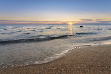 black dawn-savage beach / lonely beach in the early autumn