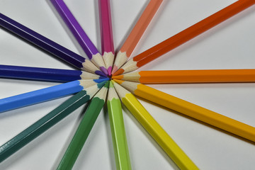 Fototapeta premium colored pencils on white background