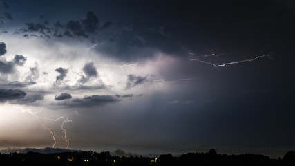 lightning from thunder cloud at night