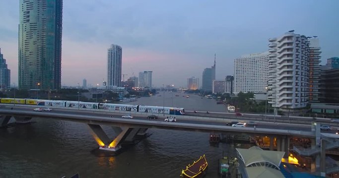 Sky Train On Chao Phraya, Bangkok, Thailand, Aerial Slider Shot
