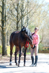 My Best friend. Young teenage girl with her favorite horse.