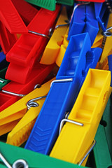 Fototapeta premium Colorful foracaps tweezers clips as background.