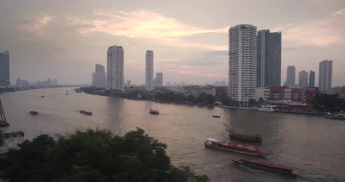 Sunset Over Chao Phraya River, Bangkok, Thailand, Drone Footage
