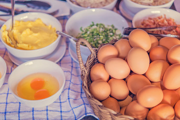 kitchen table with eggs on basket, focus from top view kitchen table.