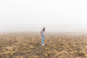 Woman inside the fog