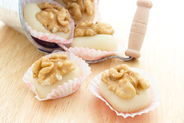 Fototapeta na wymiar Walnuts with almond paste