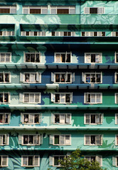 Fototapeta na wymiar Group of windows at highrise building