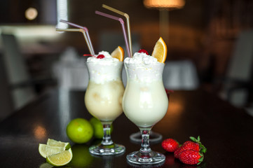 Selection of best selling drinks beer glass of wine cocktails martini mojito and shot short bar blurred background