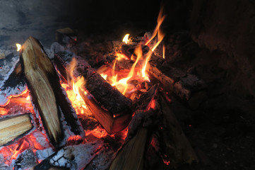 Logs burning in flames