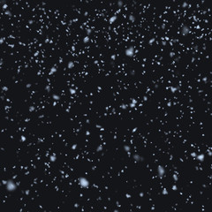 Snow falling at night