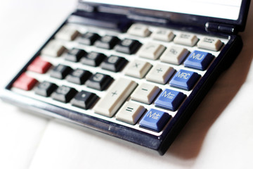 Electronic Calculator. High resolution digital photo of a calculator. This photo conveys financial management concepts such as, inflation, budget reduction, cost cutting and money saving.