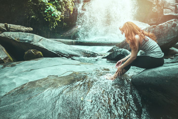 woman travelers travel nature Forests, relax play waterfall