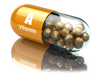 Vitamin A capsule or pill. Dietary supplements.