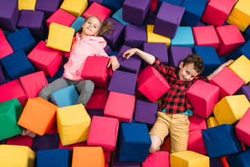 Kids play in child entertainment center