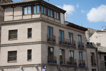 The Spanish city of Toledo. Elements of urban buildings and the castle wall.