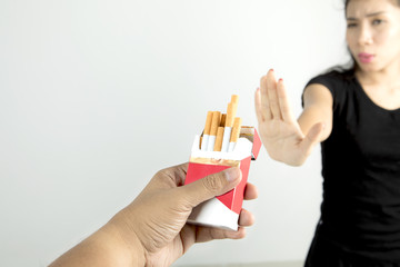 Woman refusing cigarettes