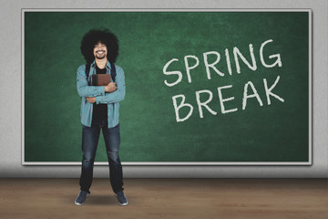 Young man with spring break word