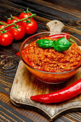 Spaghetti bolognese sauce in glass pot