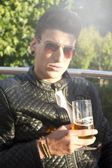 Grunge man drinking beer