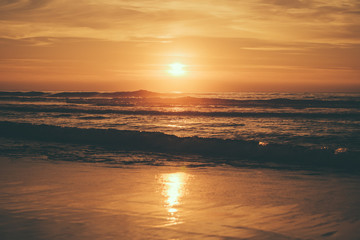 Obraz na płótnie Canvas sunset beach