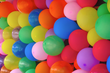 Fototapeta na wymiar many balloons birthday party colors anniversary decorations fun surprise