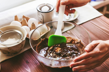 Step by step the chef prepares a dessert - chocolate fondant. Classic recipe.